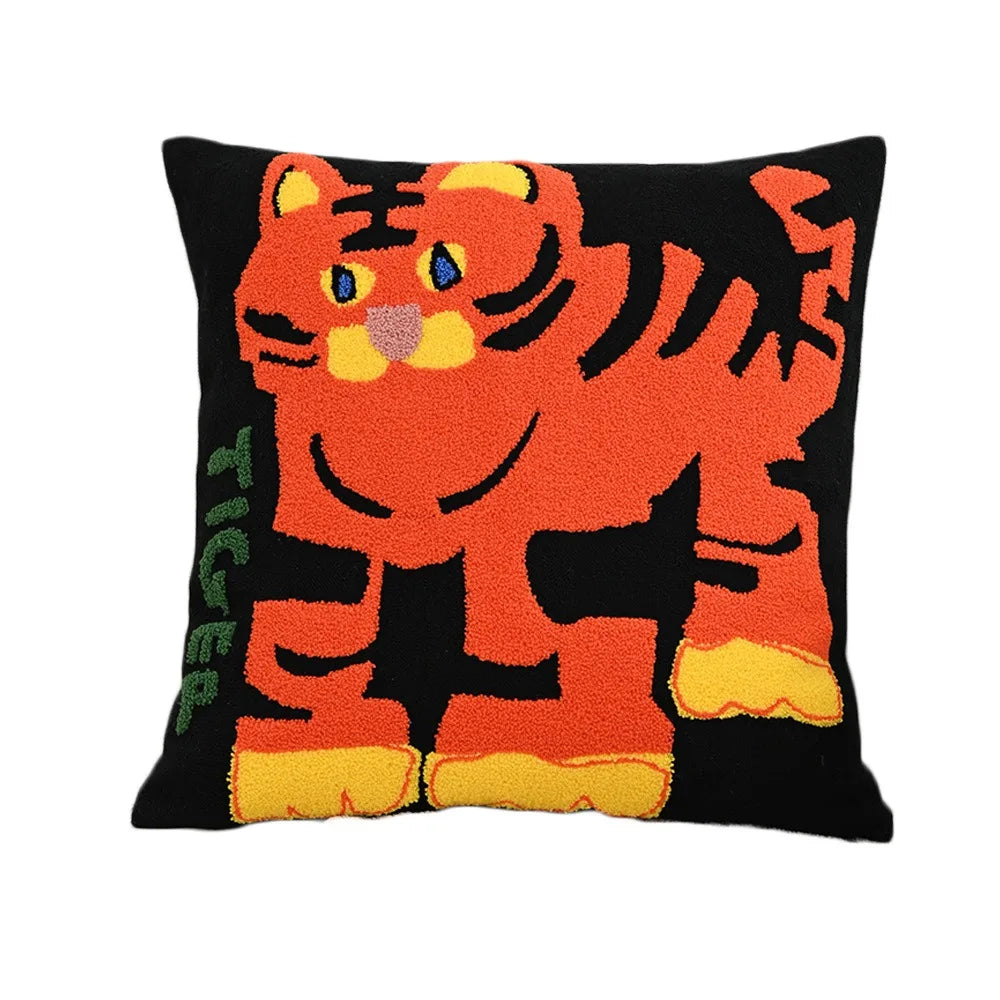Embroidered tiger on a dark blue 45x45cm cushion; bold jungle motif on rich navy pillow.