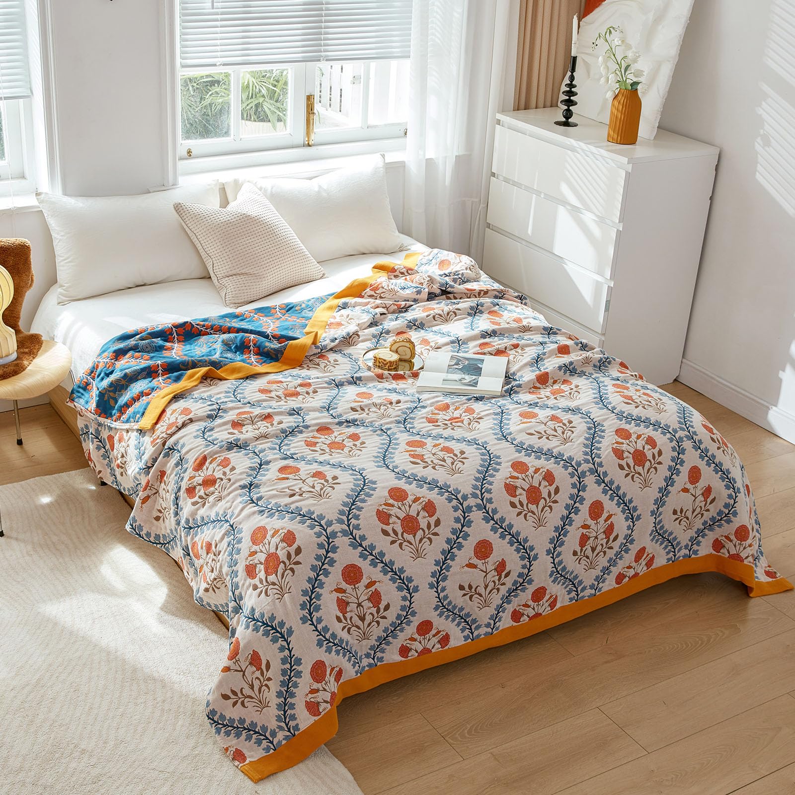 Charcoal-trimmed edge of the Garden of Stillness Throw, adding depth and grounding contrast to soft floral tones