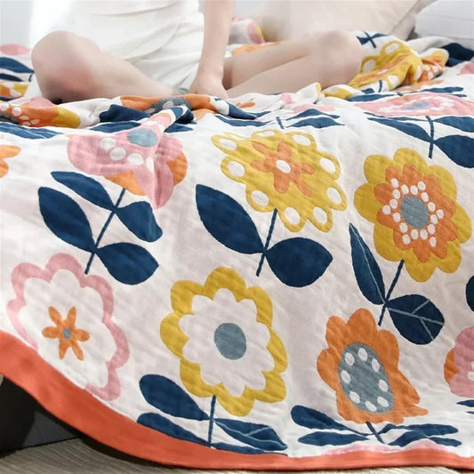 Double-sized cotton throw with sacred flower geometry, centred on king bed 