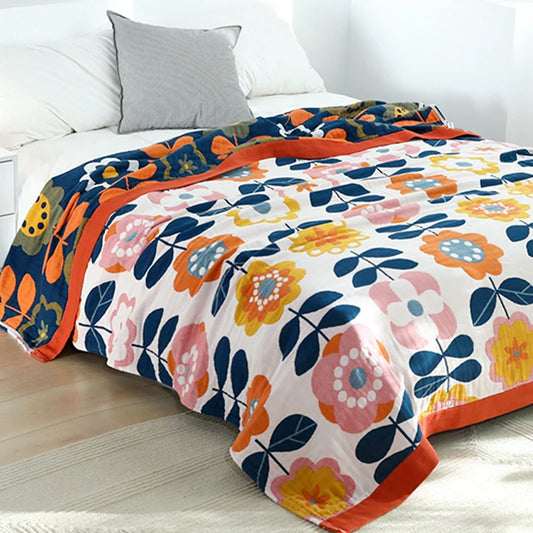 Double-sized cotton throw with sacred flower geometry, centred on king bed for grounding visual impact