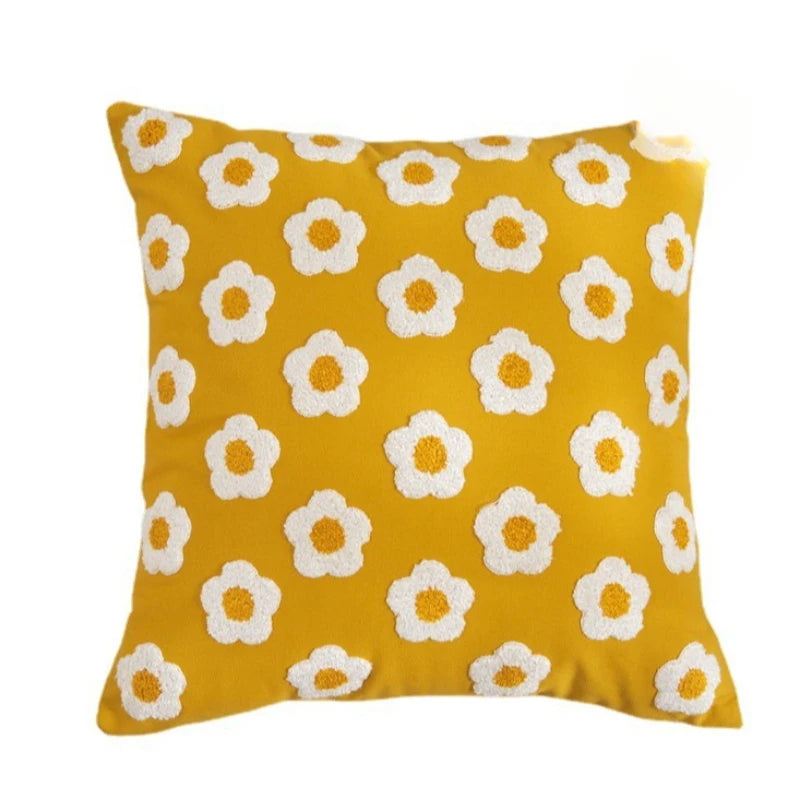 Measuring 45 x 45 cm, this cotton and polyester cushion cover is the perfect size to brighten up your home décor with effortless style and a cozy vibe.